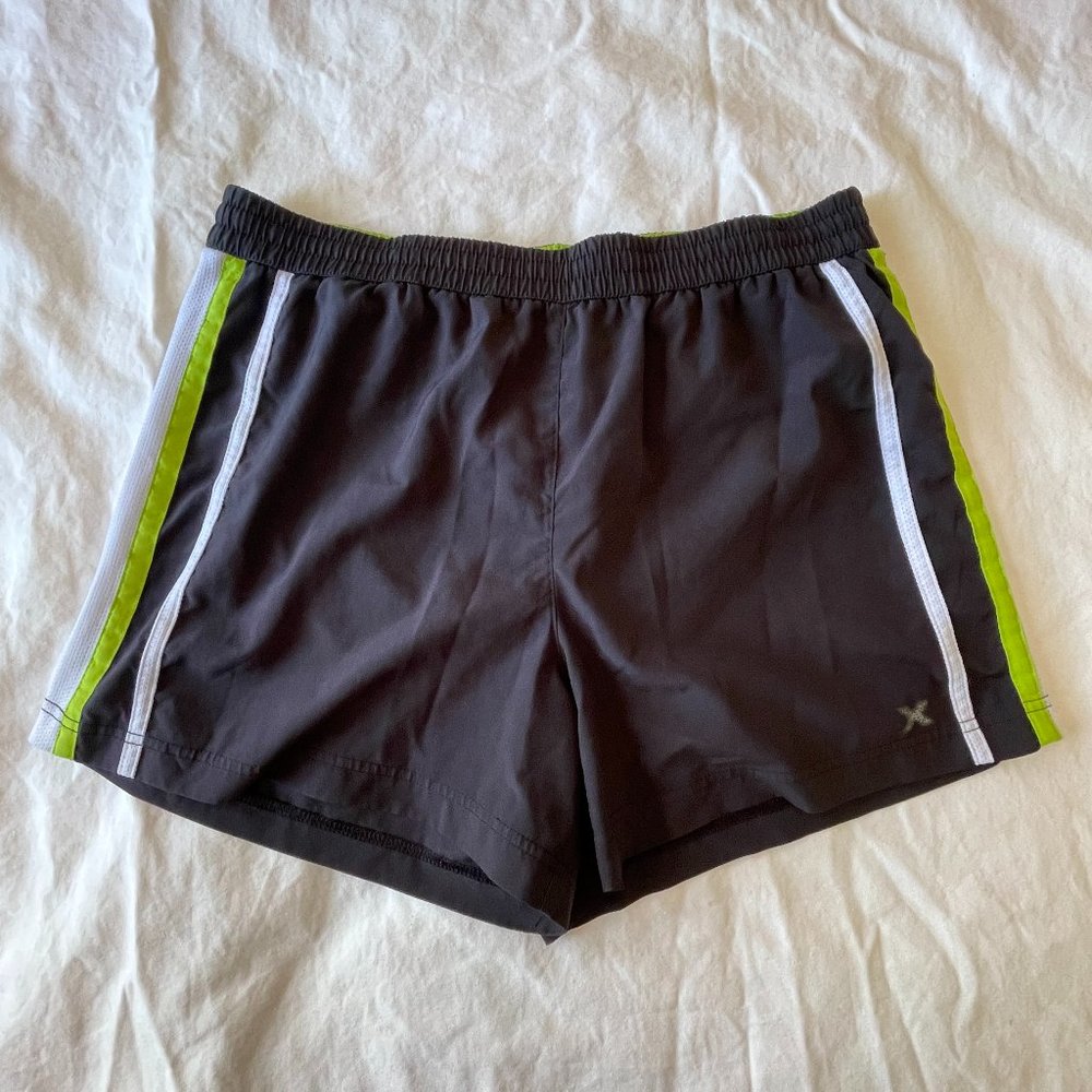 Black Athletic Shorts with White Mesh Side Panels and Lime Green Details